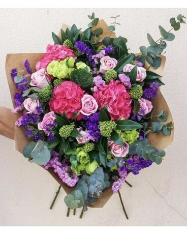 One Month FREE With a 6 month subscription Flower Arrangement